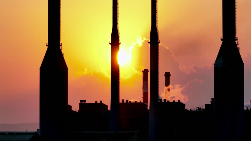 Aerial view thermal power plant at sunset. Industrial landscape of electricity production, atmospheric pollution with smoke from pipes. High quality 4k footage | Shutterstock HD Video #1108871659