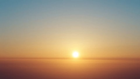 4K timelapse footage of sunrise viewed from top of mountain, sun rising from clouds horizon, golden sun with warm clouds and blue sky background. - Βίντεο στοκ
