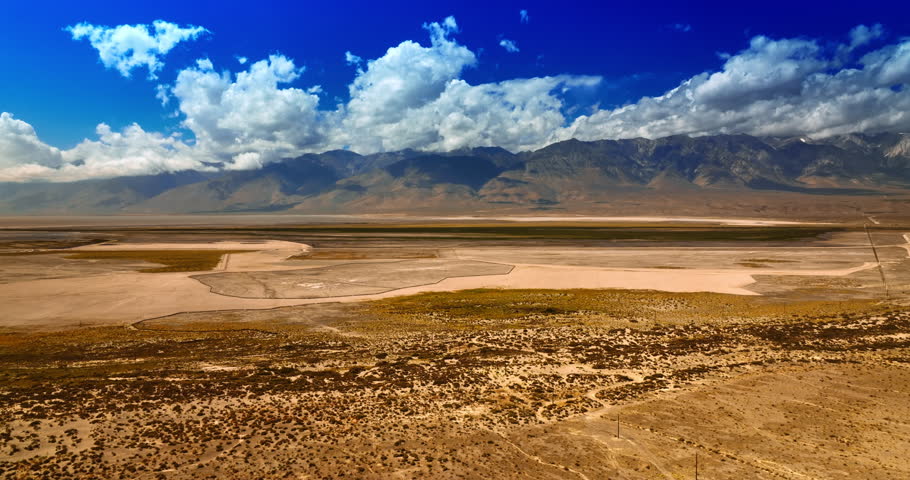 Dry landscape with no greenery. Scenery of Death Valley on sunny daytime from top.