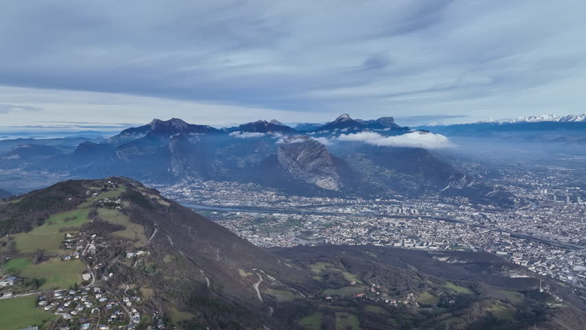 Large aerial shot over Grenoble France Alps mountains