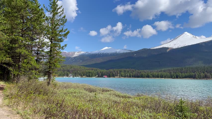 Panning left on a beautiful morning on Maligne Lake in Jasper National Park in Canada.