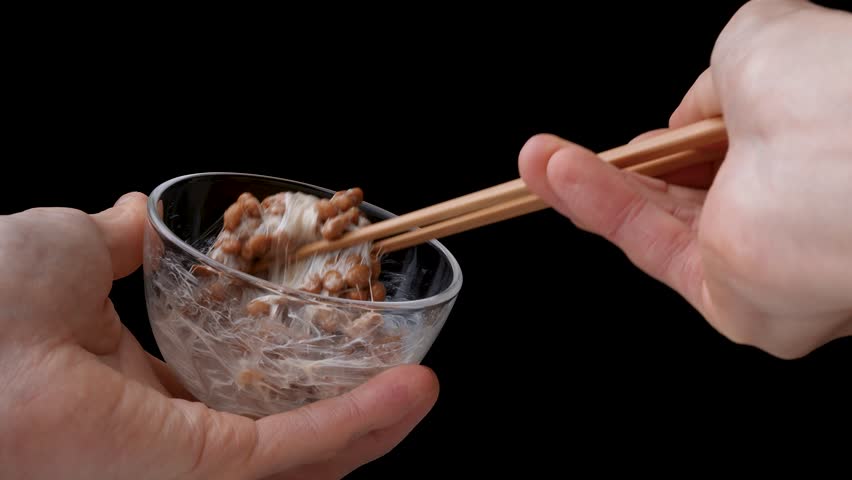 Video of mixing NATTO well on a black background.
4K 120fps edited to 30fps | Shutterstock HD Video #1108910341