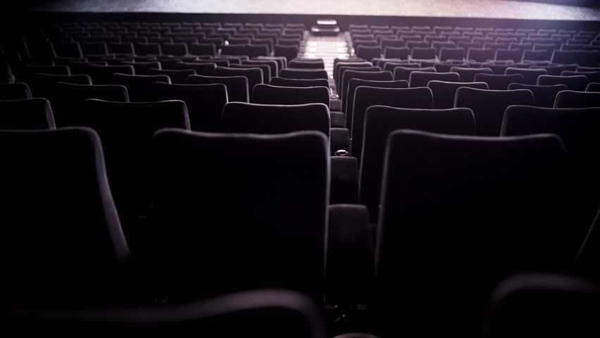 Empty seats in a movie theater - no people in the cinema during the movie performance - stock photography Royalty-Free Stock Footage #1108914667