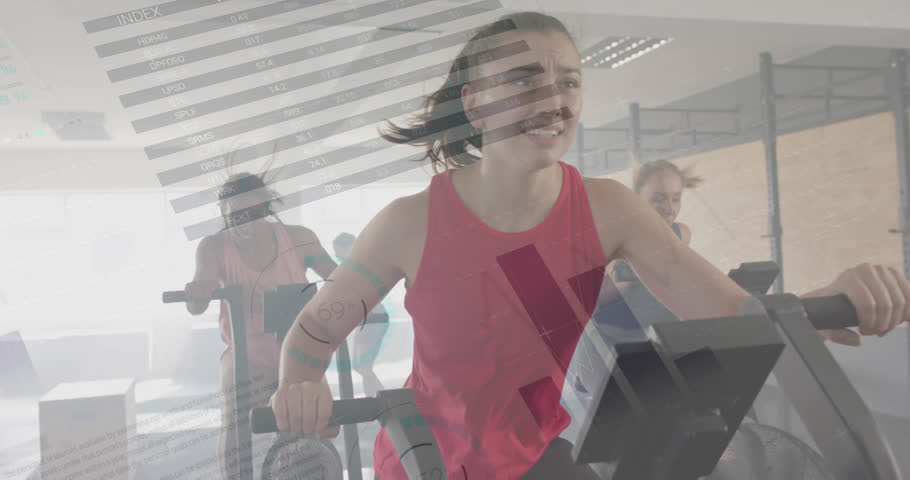 Animation of interface processing data over happy diverse women cross training on ellipticals at gym. Fitness, exercise, strength, data, digital interface and technology digitally generated video. | Shutterstock HD Video #1108916267