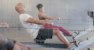 Animation of graph processing data over diverse men and woman training on rowing machines at gym. Fitness, exercise, strength, data, digital interface and technology digitally generated video.