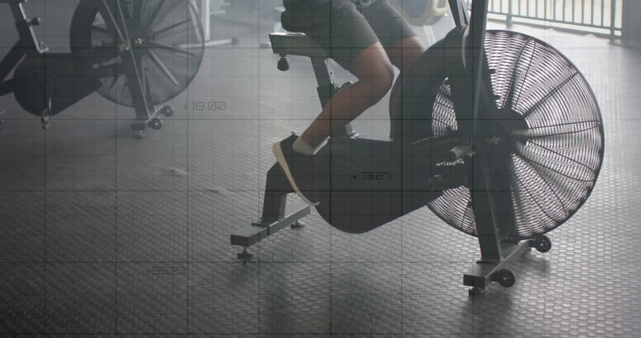 Animation of graph processing data over caucasian man cross training on elliptical at gym. Fitness, exercise, strength, data, digital interface and technology digitally generated video. | Shutterstock HD Video #1108916357