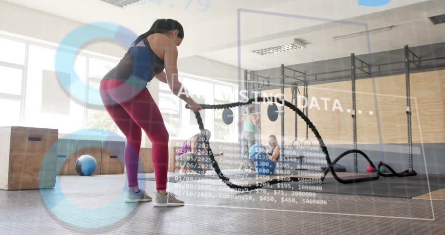 Animation of interface processing data over caucasian woman cross training with battle ropes at gym. Fitness, exercise, strength, data, digital interface and technology digitally generated video. | Shutterstock HD Video #1108916435