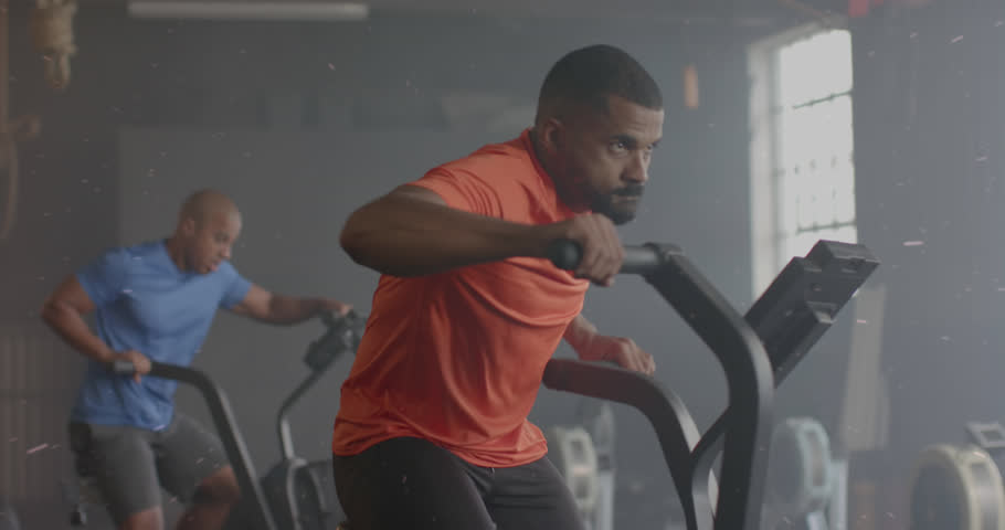 Animation of interface processing data over african american man cross training on elliptical at gym. Fitness, exercise, strength, data, digital interface and technology digitally generated video. | Shutterstock HD Video #1108916451