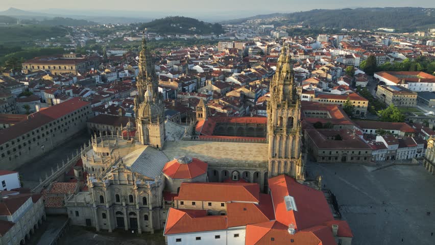 Aerial view of square and cathedral in Santiago de Compostela, Galicia, Spain. Final point of pilgrims walking Camino de Santiago path Royalty-Free Stock Footage #1108918051