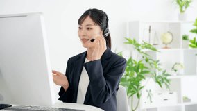 Female operator working in office. Call center. Customer support.
