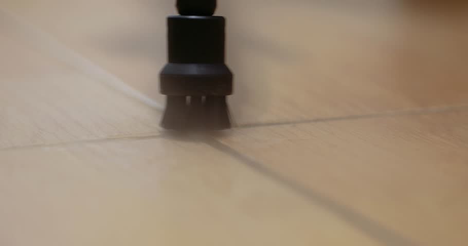 Professional cleaning steam generator cleaning tiled floor in the kitchen | Shutterstock HD Video #1108923957
