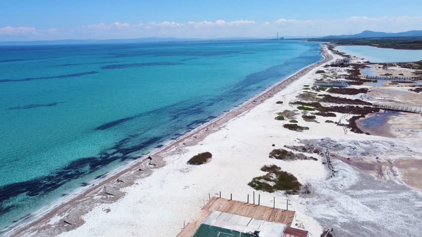 Aerial view of Le Saline beach on a sunny day. Sardinia, Italy