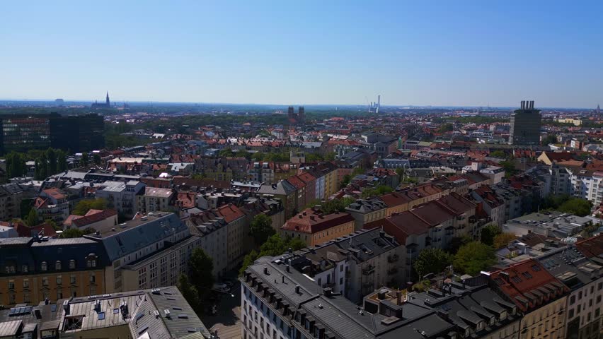 Amazing aerial top view flight Munich streets summer city Churche old Town drone