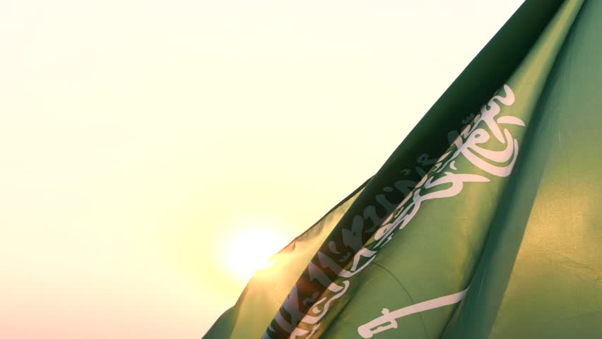 Saudi National Day. Saudi Arabia flag waving in sky against wind, beautiful sunset or sunrise outdoor backgrounds, slow motion. Concept of Saudi Arabia, Independence Day, Celebration, Holiday, Flag Royalty-Free Stock Footage #1108930929