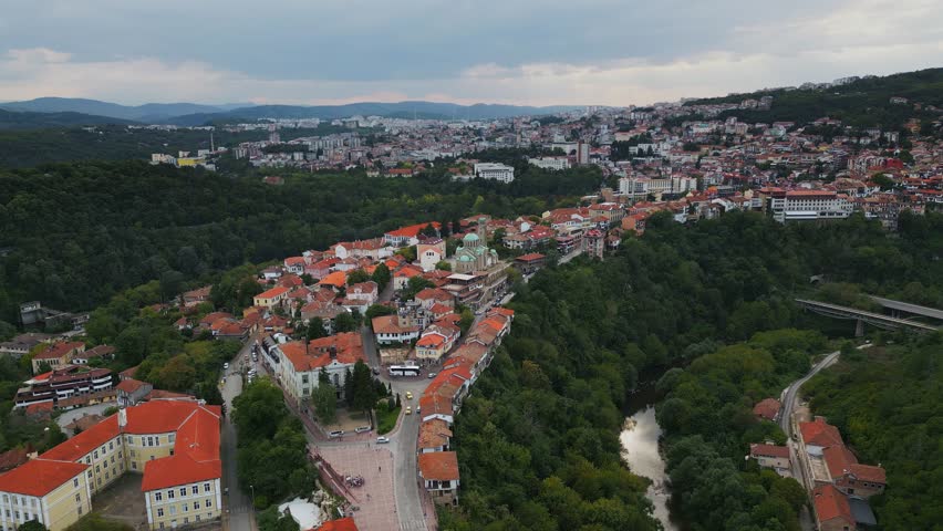 An aerial view of Veliko Tarnovo reveals a Bulgarian city rich in history and culture, with its beautiful buildings, streets, and picturesque hills.
