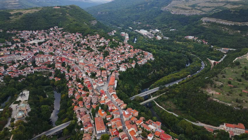 An aerial view of Veliko Tarnovo reveals a Bulgarian city rich in history and culture, with its beautiful buildings, streets, and picturesque hills.