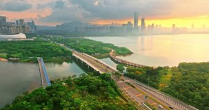 Aerial photography of Shenzhen city skyline and roads at sunrise. Advertising and trademark removed creative video