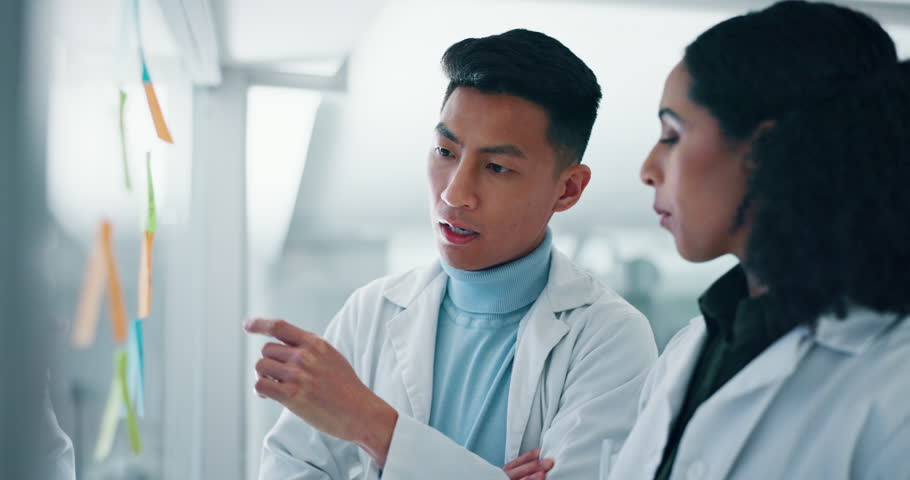 Sticky note, brainstorming and scientist team with board in lab, medical research and planning investigation. Innovation, future and man with woman work together, agenda and science collaboration | Shutterstock HD Video #1108935065