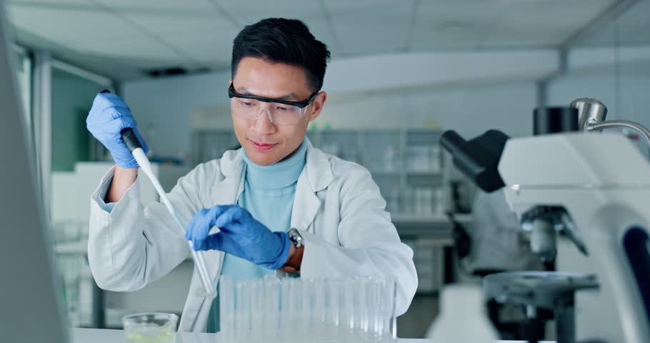 Scientist man, chemistry and liquid in test tube, science experiment and medical research in laboratory. Asian doctor, chemical in glass container with dropper, investigation for pharmaceutical study | Shutterstock HD Video #1108935073