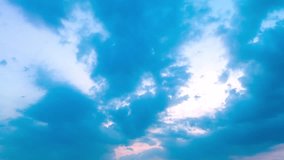 
aerial hyper lapse view blue cloud in sweet sky of sunset.
Scene of romantic beautiful sky sunset with slow moving cloud in the sky background.
Nature video High quality footage.Gradient color. 
