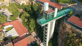 Aerial view, an elevator, and a viewpoint of the historic harbor of the city of Antalya, Turkey.