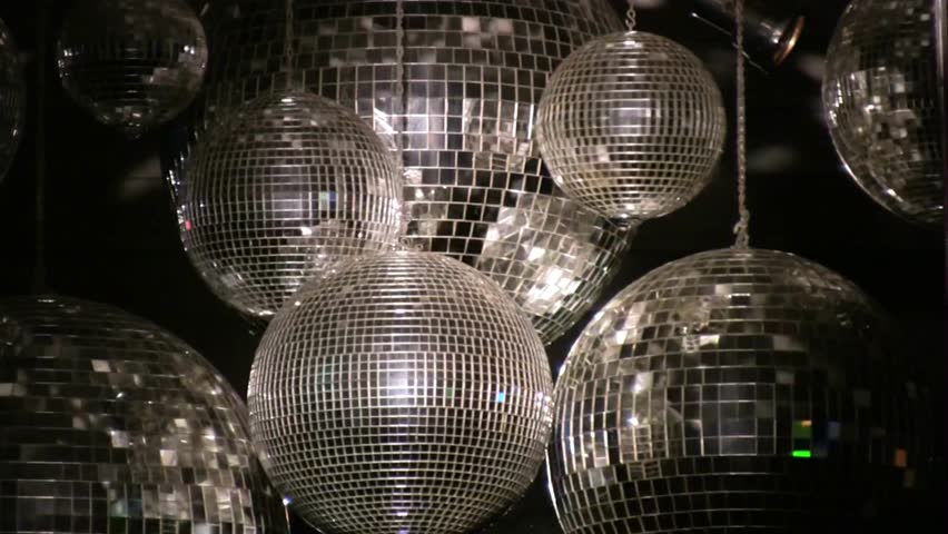 Rotating sparkling disco ball. Concept of night party. Neon Disco ball seamless VJ loop animation for music broadcast disco party ball in lighting. Royalty-Free Stock Footage #1108940129