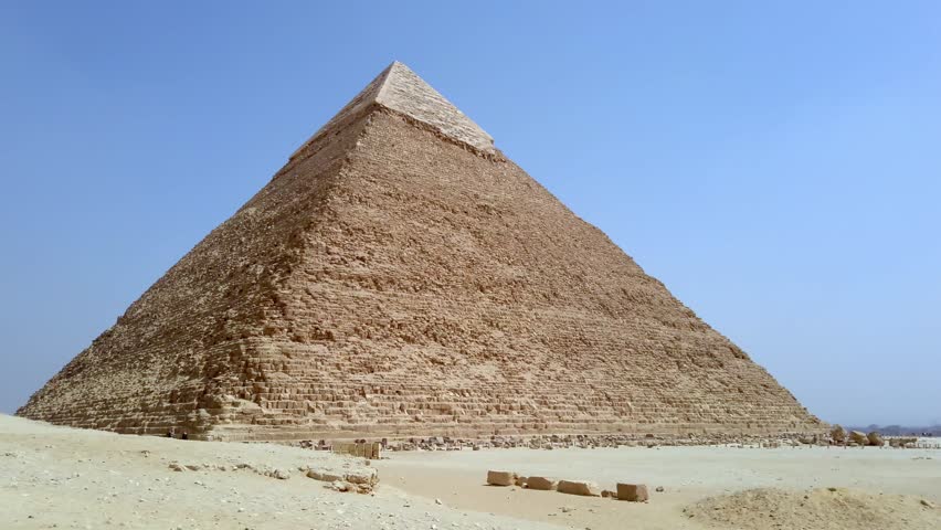 Low angle view of Pyramid of Khafre. Giza, Greater Cairo, Egypt Royalty-Free Stock Footage #1108941869