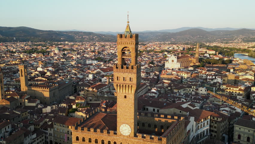 Florence city skyline, aerial view at sunset, Palazzo Vecchio, Cathedral of Saint Mary of the Flower, Tuscany, Italy Royalty-Free Stock Footage #1108958071