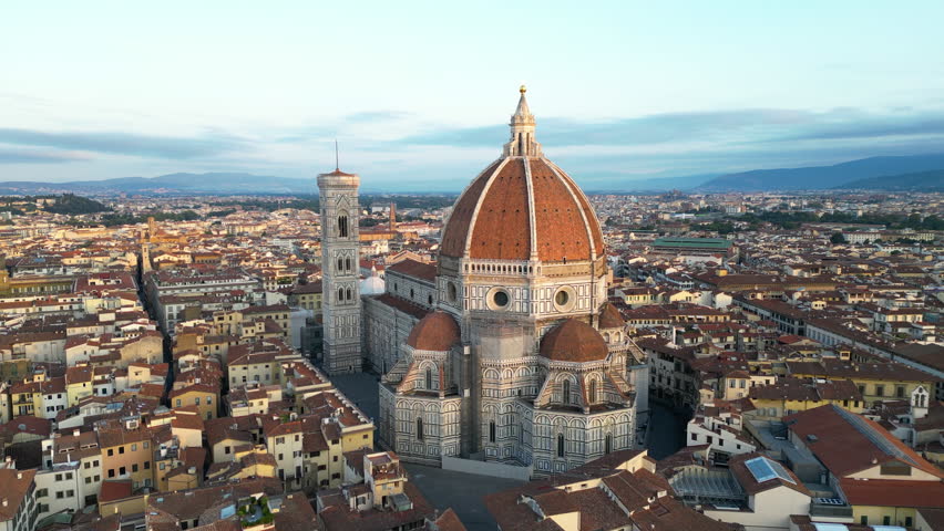 Aerial close view of the Florence Cathedral (Duomo di Firenze) at sunset, Tuscany, Italy Royalty-Free Stock Footage #1108958141