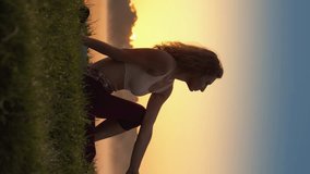 Complete relaxation and concentration during yoga practice in nature. Use the forces of nature to promote physical and mental health. Vertical Video Morning Yoga for Energy Boost
