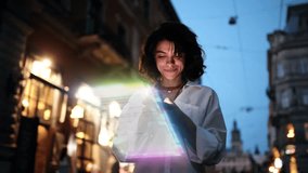 Beautiful Smiling Woman Using Phone on a City Street at Night. Visualization of Social Media, Chatting, Texting, Messaging App Icons. Social Networking Service - Powered by Shutterstock - Get 15% off with code: PIKWIZARD15