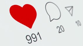 Reacting on post in social network app on a phone or laptop screen. Like comment and share repost icons. Macro close up view Instagram or Tik-Tok. Concept of popularity blogger star and content likes - Powered by Shutterstock - Get 15% off with code: PIKWIZARD15