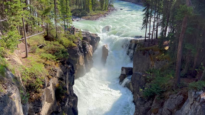 Sunwapta Falls along the Ice Fields Parkway in Jasper National Park in Canada on a beautiful day.