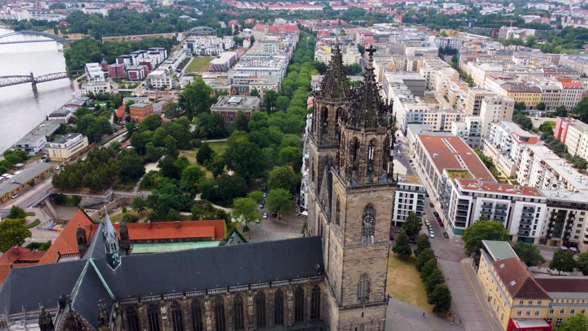 Aerial view of Magdeburg with the Dom of Magdeburg, Drone shot flying towards the dom of Magdeburg | Shutterstock HD Video #1108973691