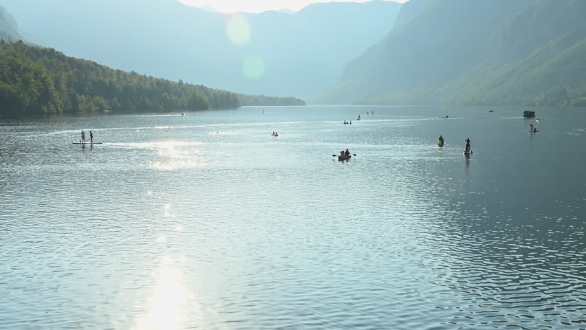 Lake Bohinj water sport and recreational outdoor activity in summer afternoon