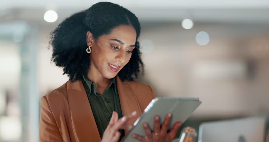 Businesswoman with tablet, smile and scroll, thinking and reading email, review or article at startup. Internet, research and happy woman with digital app for with networking, social media and meme. Royalty-Free Stock Footage #1108982449