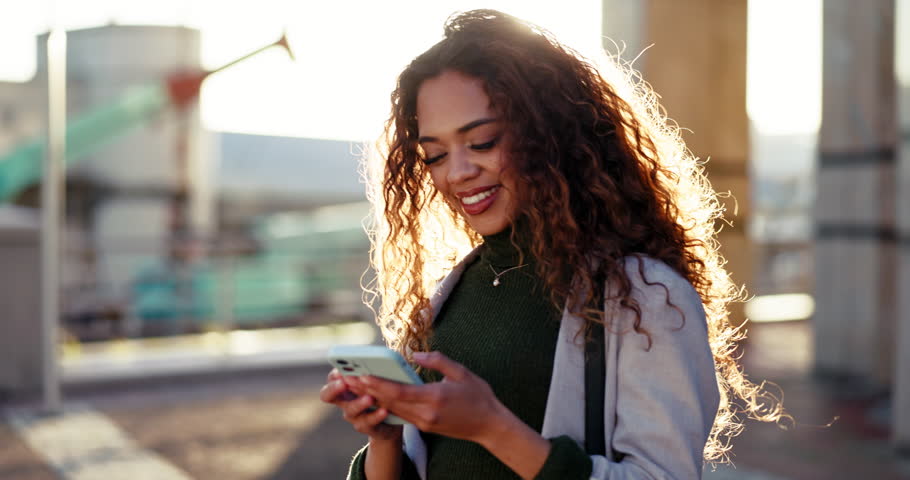 City, funny and woman with a smartphone, connection and lens flare with digital app, email notification and network. Person, outdoor and contact with a cellphone, connection and humor with internet | Shutterstock HD Video #1108982937