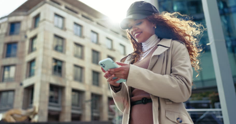 Outdoor, smile and woman with a smartphone, connection with digital app, lens flare and network with a smile, mobile user and typing. Person, city and girl with a cellphone, social media and contact | Shutterstock HD Video #1108983003