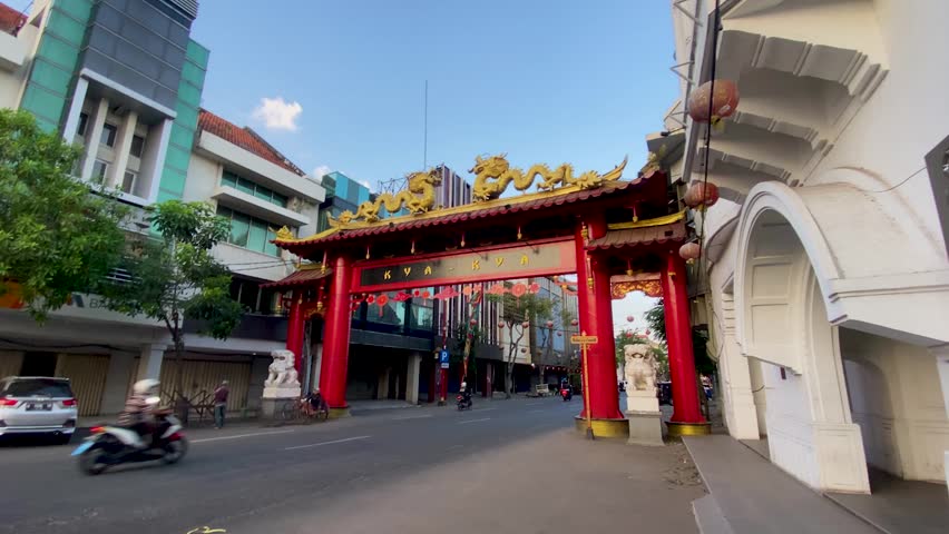 Surabaya, Indonesia - September 23 2023

Gapura One of the famous Chinatown areas in Surabaya, Kya Kya

motor vehicle traffic during the day