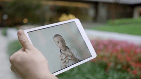 People Having A Video Call Conference Talking Together on Mobile Tablet Screen