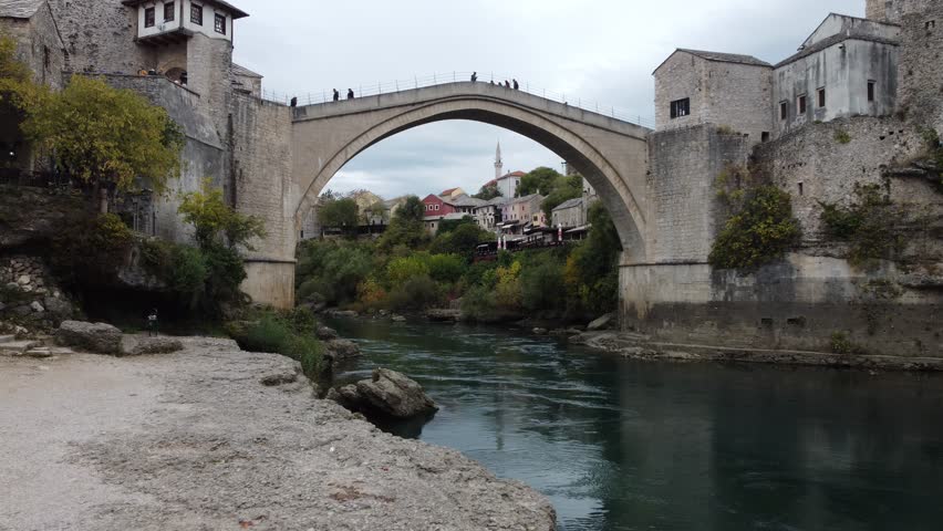 Drone flight near the historical old Mostar Bridge. Bosnia and Herzegovina, Europe | Shutterstock HD Video #1108987553