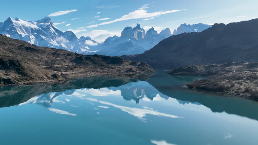 Scenic Lake At Torres Del Paine Punta Arenas Chile. Riverside Torres Del Paine Punta Arenas. Nature Cityscape Snow Covered Forest Trees. Nature Exterior Snow Covered Patagonia Panning Wide. Royalty-Free Stock Footage #1109002089