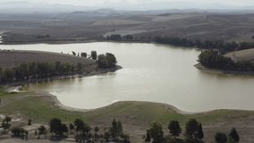 Aerial videos of the Torre del Águila reservoir, which is located a few kilometers from the town El Palmar de Troya, in the province of Seville.