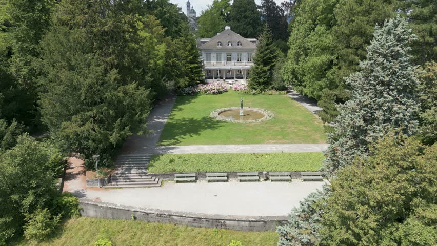 Drone shot of historic villa in Zürich in Switzerland  | Shutterstock HD Video #1109003481