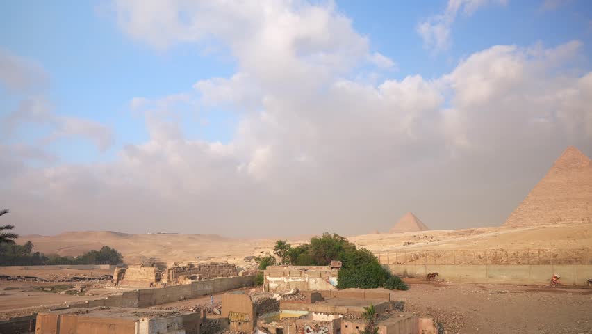 Panoramic view of The Egyptian pyramids of Giza in the morning. Cairo, Egypt. Ancient mystical Wonders of the World