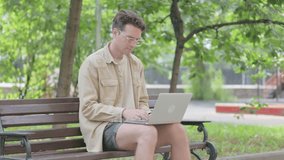 Modern Young Man Doing Online Video Chat Outdoor