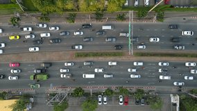 Vertical video. Aerial view of traffic jam on a multi-level highway in Bangkok city.