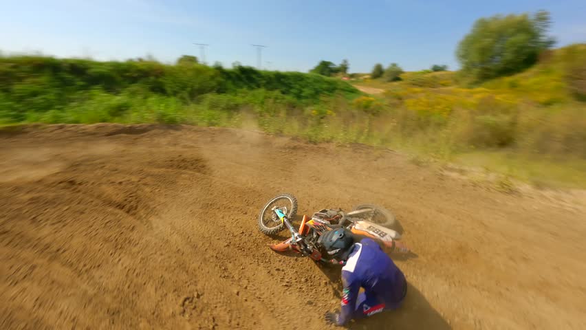 FPV of a crash accident on a motocross track. High-speed.