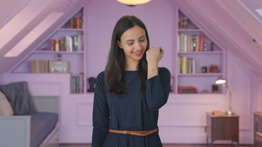 Happy Indian girl removing the bandage