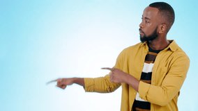 Black man, pointing and happy face with decision for promotion, checklist and presentation for deal and choice. Blue background, studio and model with information and announcement of promo with smile - Powered by Shutterstock - Get 15% off with code: PIKWIZARD15